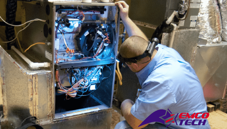 Service Technician Performing Furnace Inspection