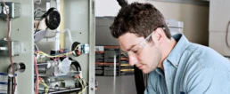 Fixing Your Furnace Before it Completely Malfunctions - EMCO Tech Heating & Cooling Technician Repairs Furnace