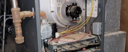 Furnace Smells Like Rotten Eggs Why It's Dangerous and How to Fix It Fast - EMCO Tech Furnace fixing without cover