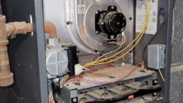 Furnace Smells Like Rotten Eggs Why It's Dangerous and How to Fix It Fast - EMCO Tech Furnace fixing without cover