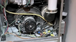 Common Reasons Furnace Breaks Down - High Efficiency Gas Furnace With Cover open and Not Working - EMCO Tech Heating Cooling