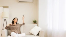 Ductless Minisplit Air Conditioner - Woman enjoying AC