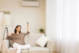 Ductless Minisplit Air Conditioner - Woman enjoying AC