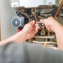 Furnace Repair Technician Working