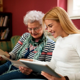 Happy Customer Looking at Family Pictures in West Chester