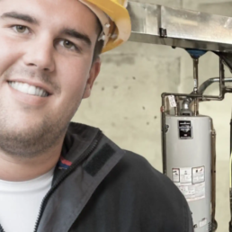 Heating Repair Services in Willow Grove PA - Technician Fixing Furnace Heater