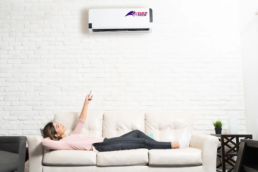 Choosing the right Ductless Mini-Split - happy customer enjoying new ductless mini split system
