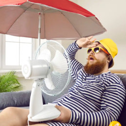 Broken AC in the middle of Summer - Man with fan and umbrella Heat Waves