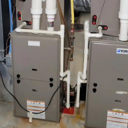 2 York HVAC Gas Furnace Systems in Basement