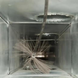 Air Duct Cleaning with Rotary Brush Inside the Main Ductwork