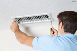Vent Cleaning HVAC Service Technician Removing Grill