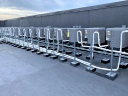 Commercial HVAC Services - New Construction Apartment Building Many AC Systems Installed on the Roof