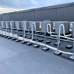 Commercial HVAC Services - New Construction Apartment Building Many AC Systems Installed on the Roof