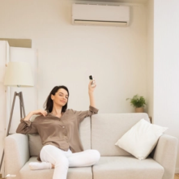Ductless Minisplit Air Conditioner - Woman enjoying AC