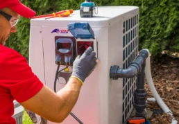 HVAC Repair Technician Working on AC Unit in Delaware County PA