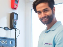 HVAC Services in Ambler PA - Technician Fixing Tankless Boiler