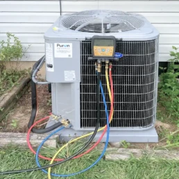 Residential HVAC Services in Richboro and Churchville - New Carrier HVAC System Installation - AC Unit With Freon Gauges