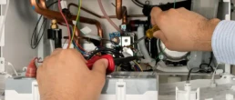 Tankless Boiler Services in Philadelphia - EMCO Tech Plumber is Working with High Efficiency Tankless Boiler Repairs