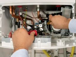 Tankless Boiler Services in Philadelphia - EMCO Tech Plumber is Working with High Efficiency Tankless Boiler Repairs
