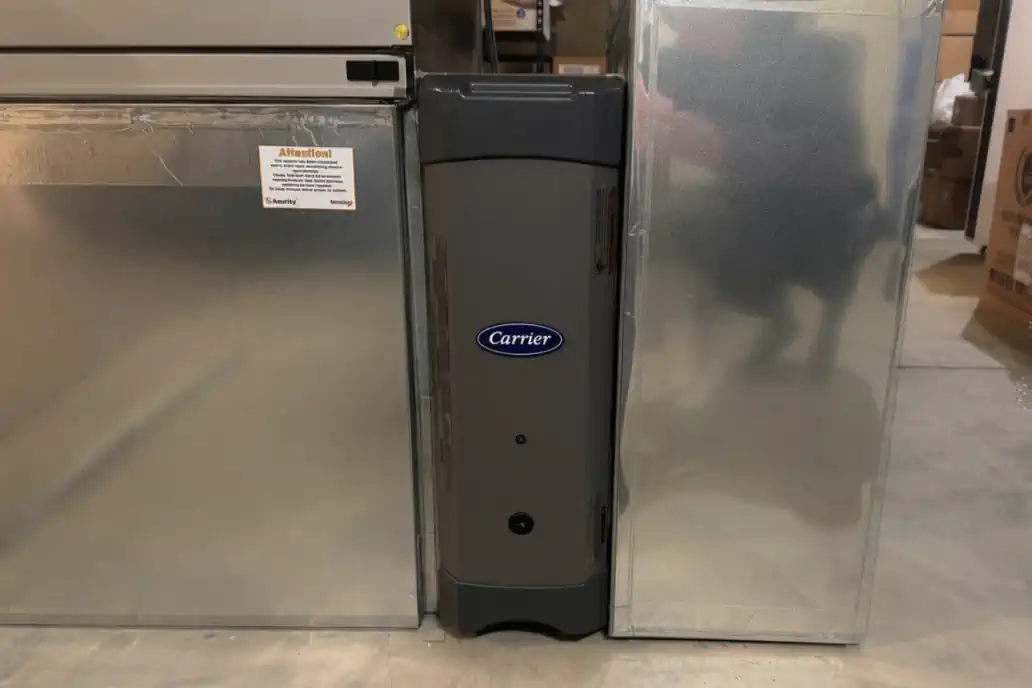 Carrier whole-house air purifier installed in home HVAC ductwork by EMCO Tech in Philadelphia