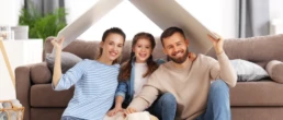 Family in their home - Happy family is glad to have the whole house gas furnace installation in Philadelphia done by EMCO Tech