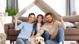 Family in their home - Happy family is glad to have the whole house gas furnace installation in Philadelphia done by EMCO Tech