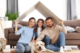 Family in their home - Happy family is glad to have the whole house gas furnace installation in Philadelphia done by EMCO Tech
