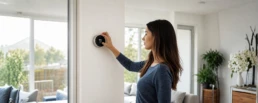 EMCO Tech - Woman Turning on AC for the First Time using thermostat